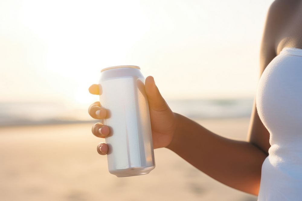Holding beach drink refreshment. AI generated Image by rawpixel.