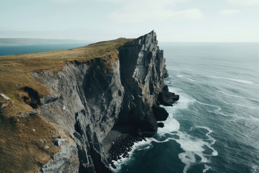 Cliff ocean outdoors nature. 