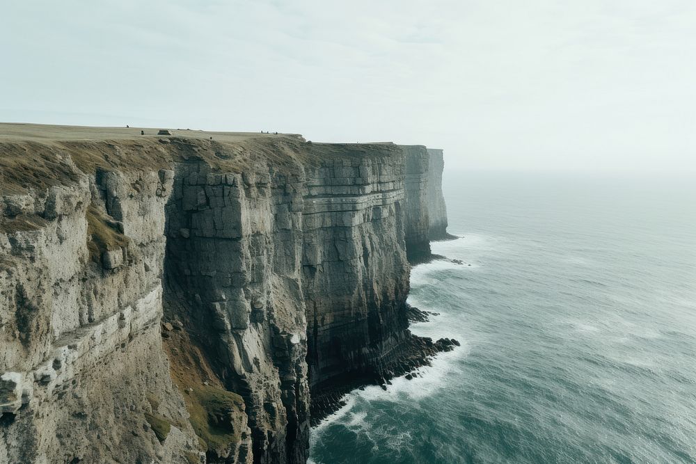 Cliff ocean outdoors nature. AI generated Image by rawpixel.