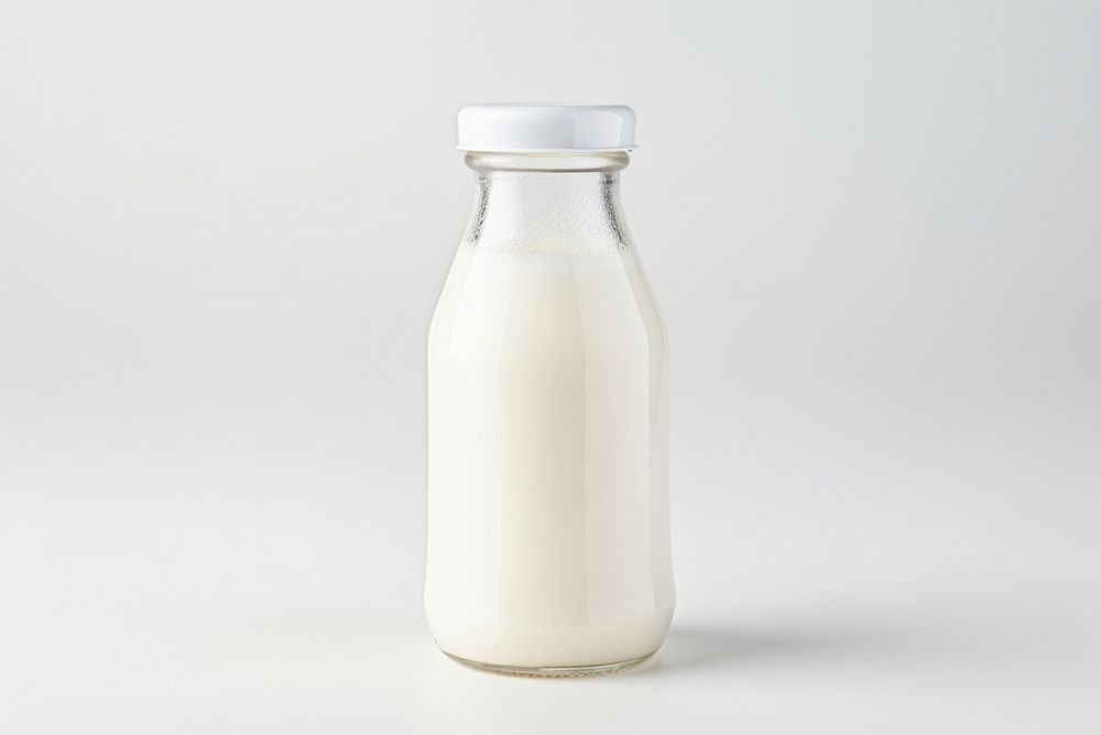 Milk bottle dairy white background. AI generated Image by rawpixel.