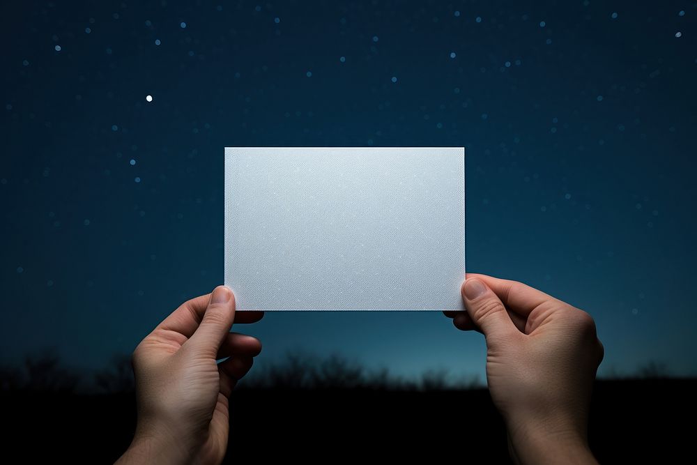 Night hand sky holding. AI generated Image by rawpixel.