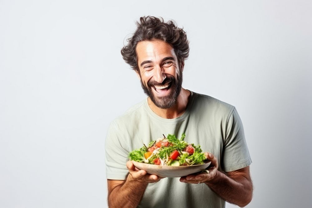 Laughing eating adult salad. AI generated Image by rawpixel.