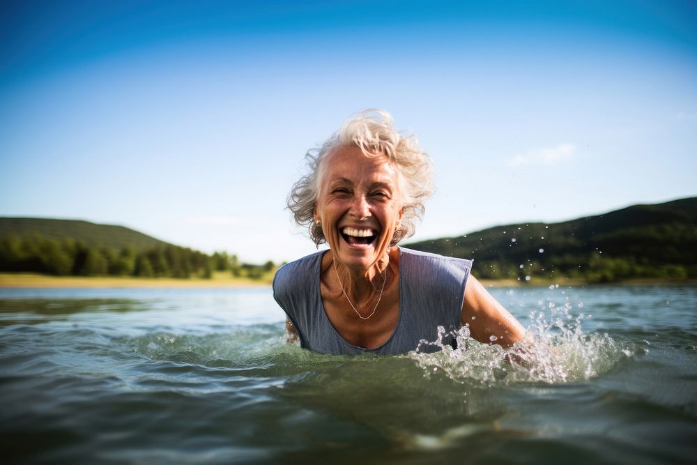 Laughing recreation swimming outdoors. AI generated Image by rawpixel.