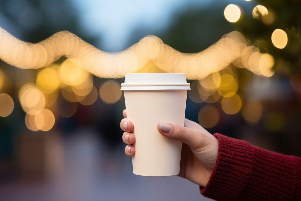 Cup outdoors holding coffee. AI generated Image by rawpixel.