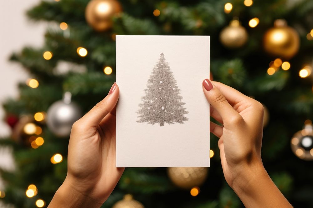 Christmas holding paper tree. AI generated Image by rawpixel.