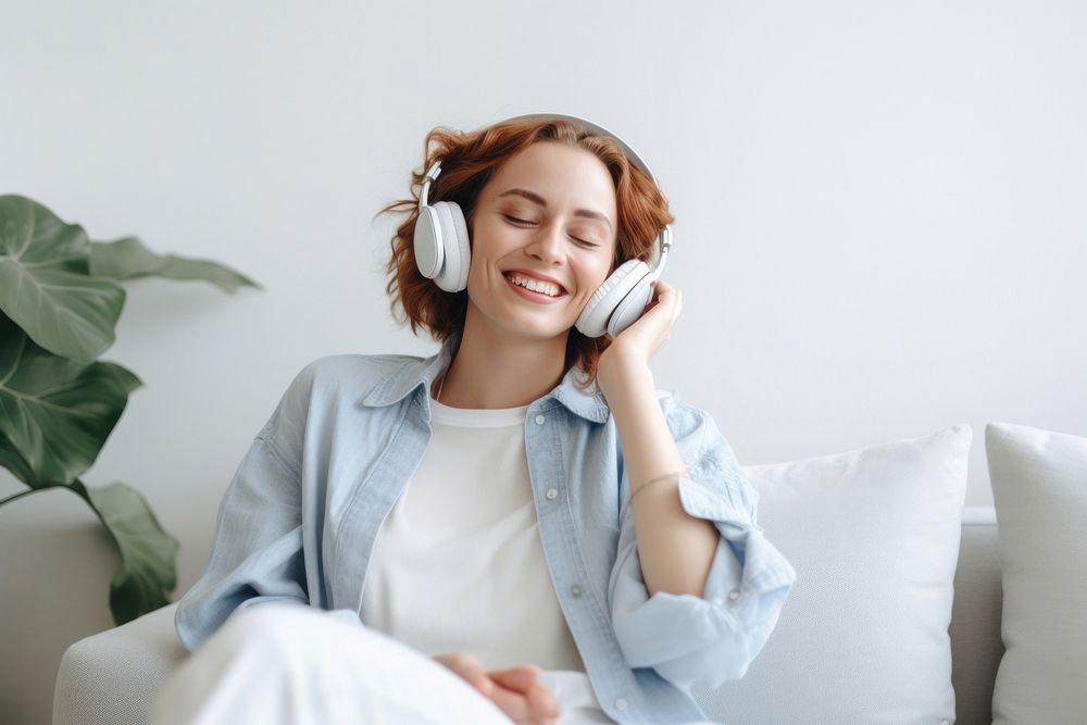 Headphones sitting headset smiling. 