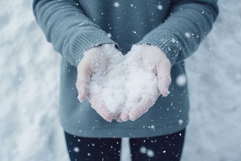 Snow outdoors holding glove. AI generated Image by rawpixel.