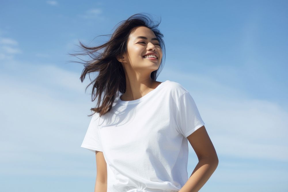 Laughing outdoors t-shirt smiling. 