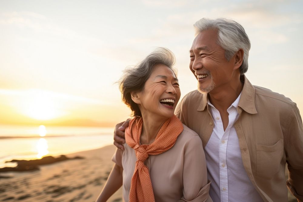 Laughing retirement happiness sunset. 