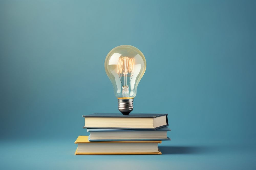 Light lightbulb book intelligence. AI generated Image by rawpixel.