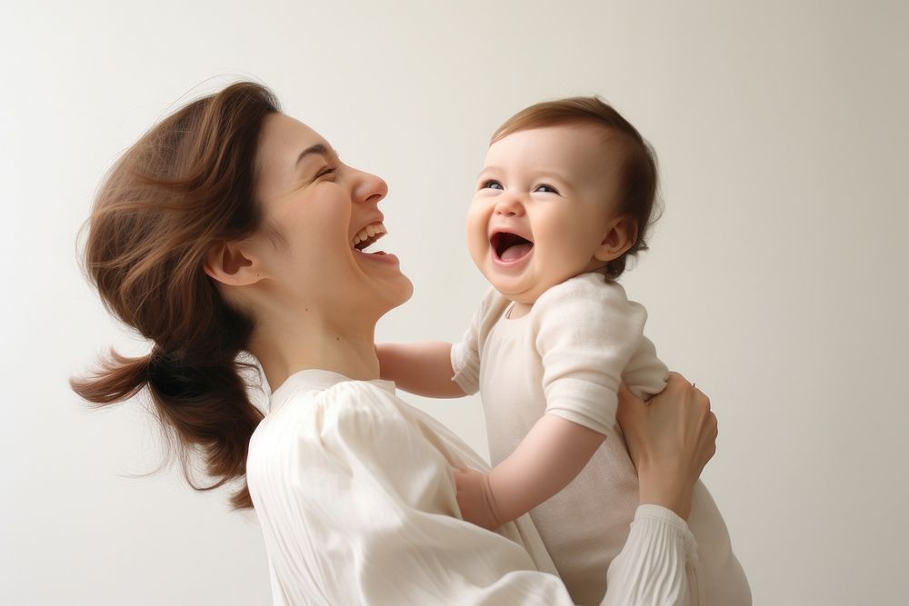 Baby laughing adult happy. AI generated Image by rawpixel.