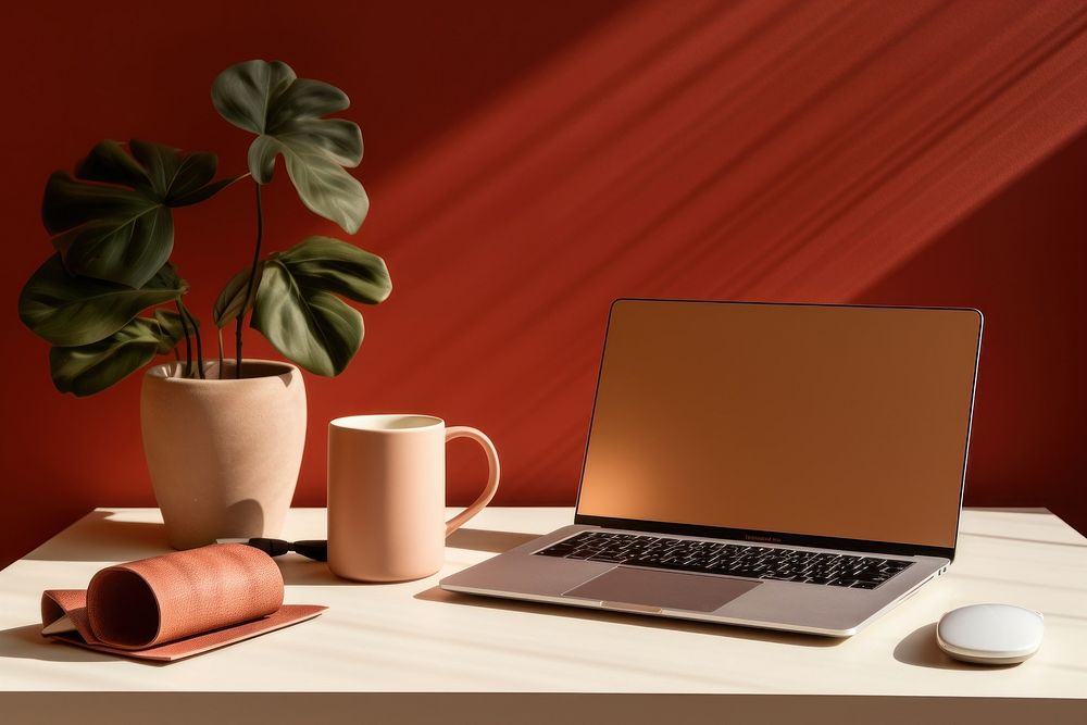 Furniture computer laptop coffee.