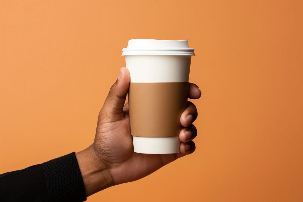 Coffee cup holding latte. AI generated Image by rawpixel.