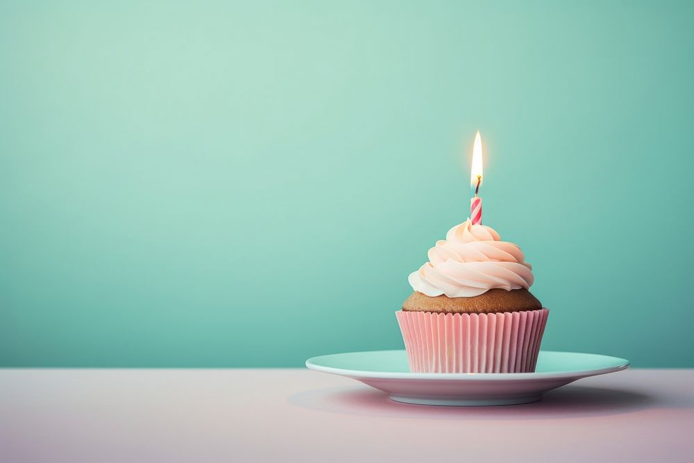 Cupcake candle birthday dessert. AI generated Image by rawpixel.