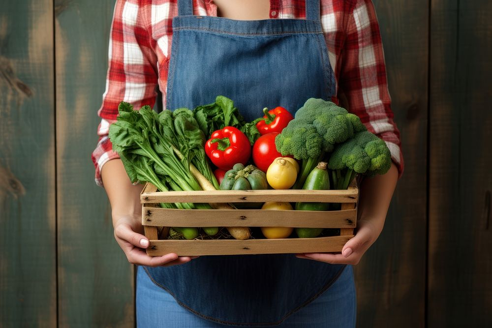 Vegetable holding basket adult. AI generated Image by rawpixel.