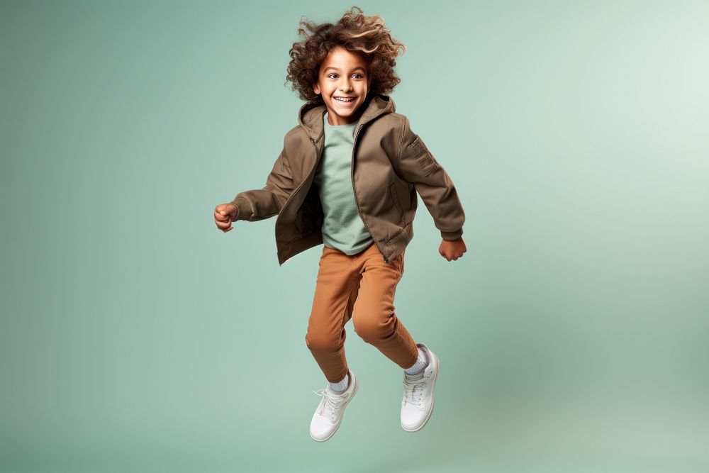 Jumping footwear child brown. AI generated Image by rawpixel.
