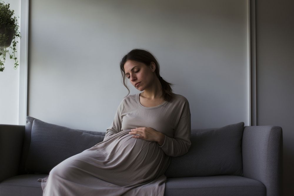 Sitting furniture pregnant adult. AI generated Image by rawpixel.