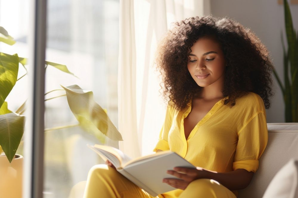 Reading sitting yellow adult. 