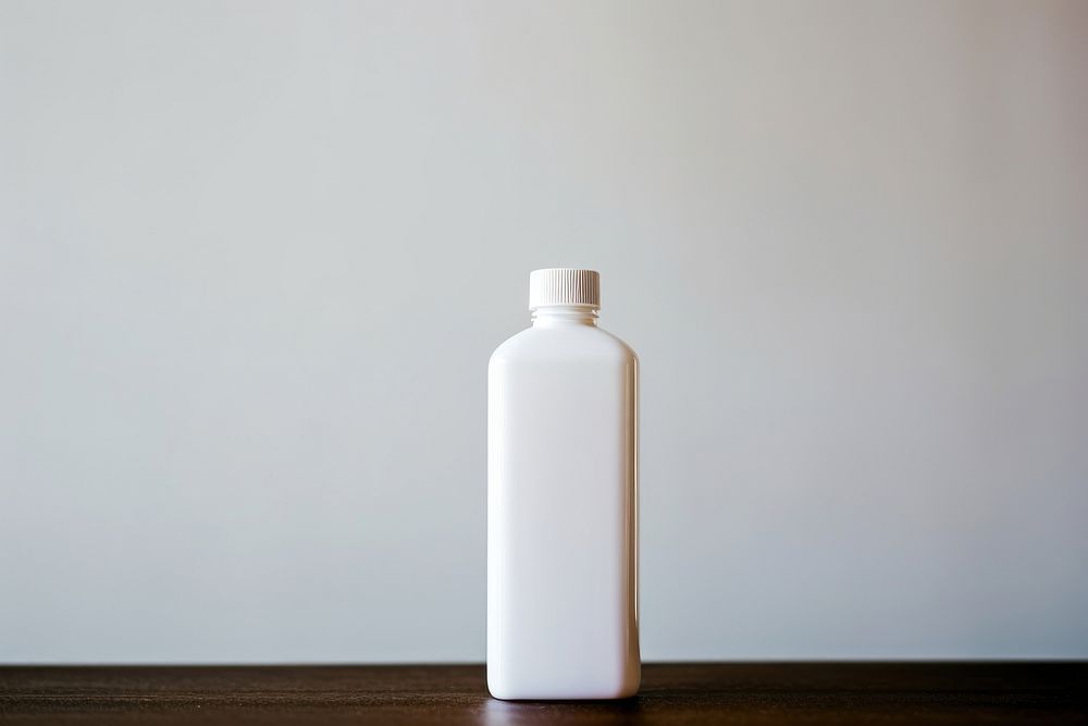 Bottle white refreshment drinkware. AI generated Image by rawpixel.