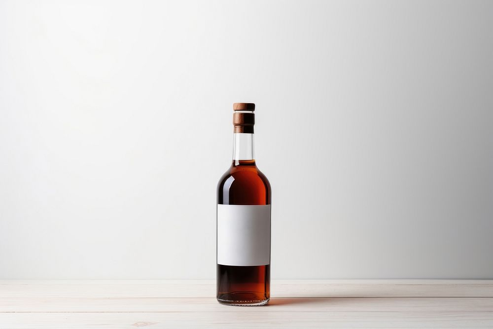 Bottle glass label table. AI generated Image by rawpixel.