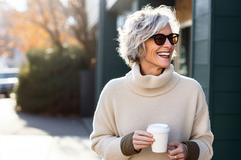 Sweater cup laughing holding. 