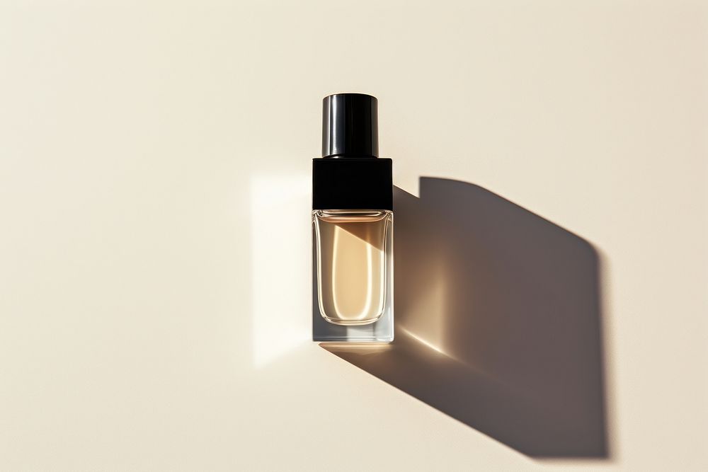 Bottle cosmetics perfume shadow. 