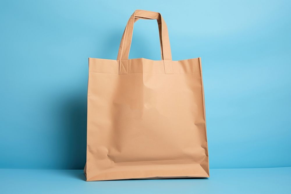 Bag handbag brown blue. AI generated Image by rawpixel.