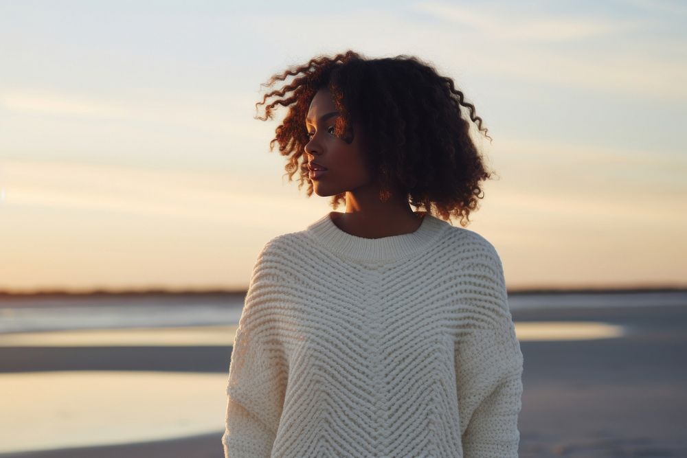 Sweater looking sunset beach. 