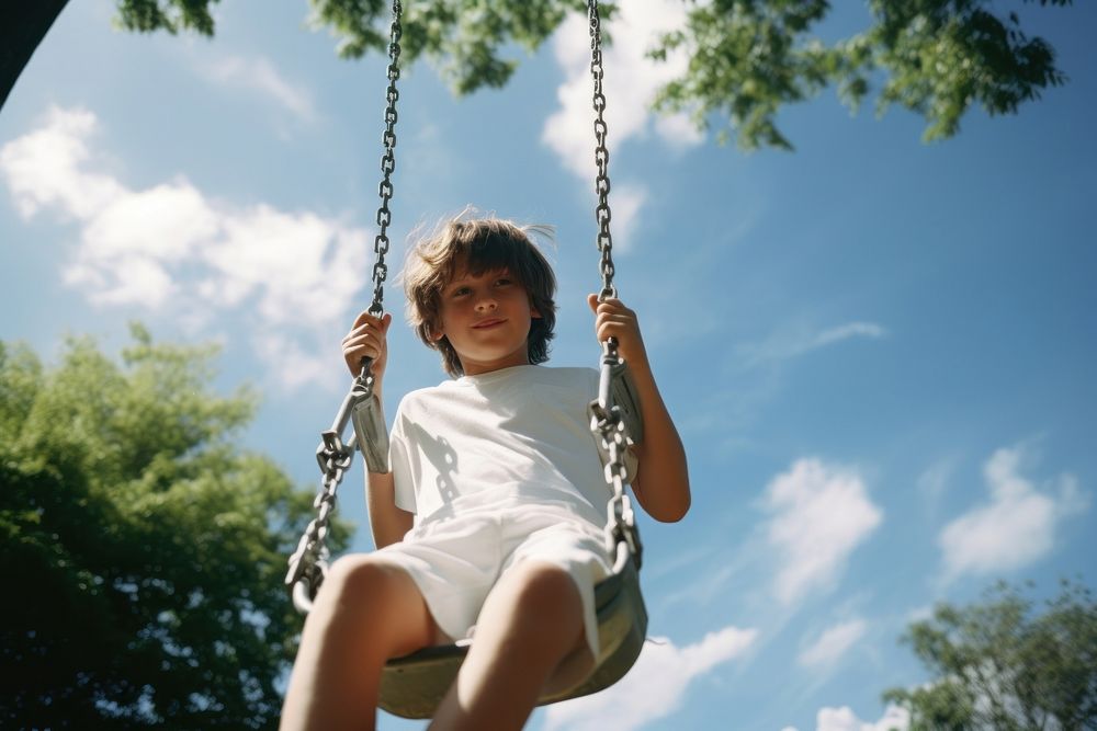 Playground swing portrait outdoors. 