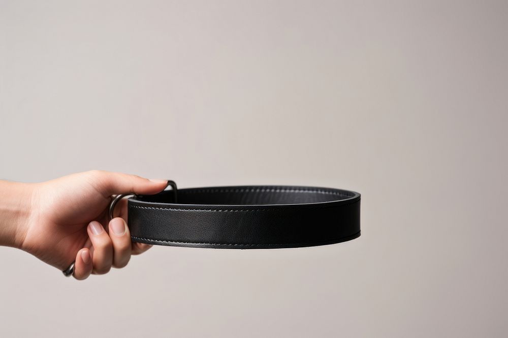 Holding strap belt hand. AI generated Image by rawpixel.