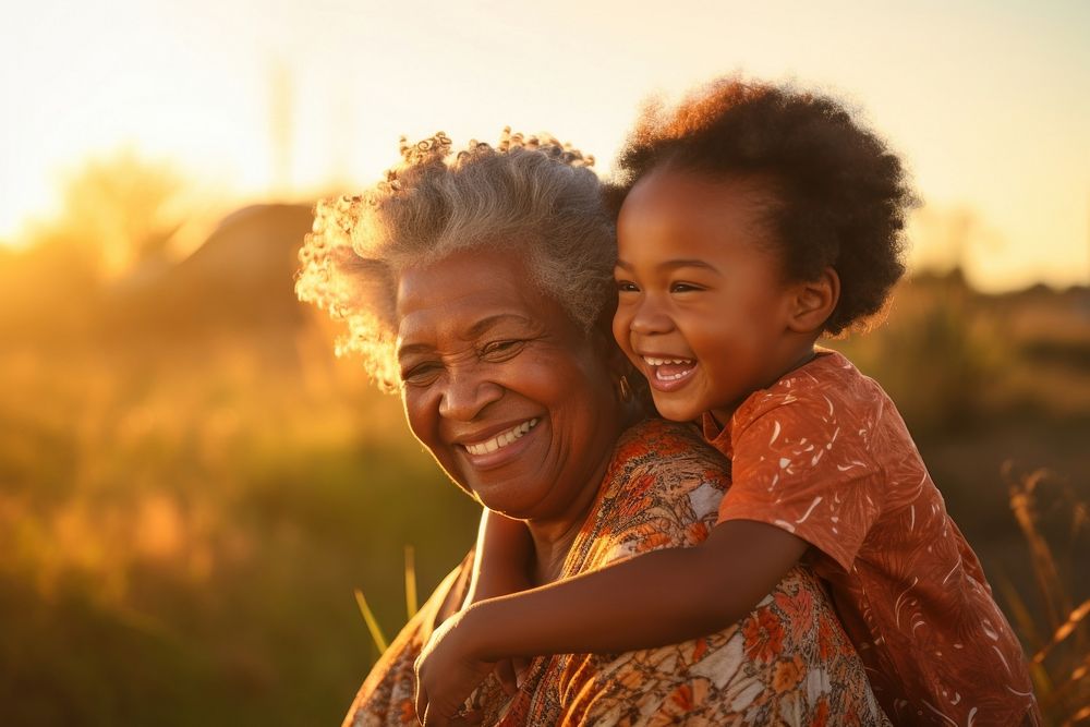Grandmother grandchild laughing sunset. AI generated Image by rawpixel.