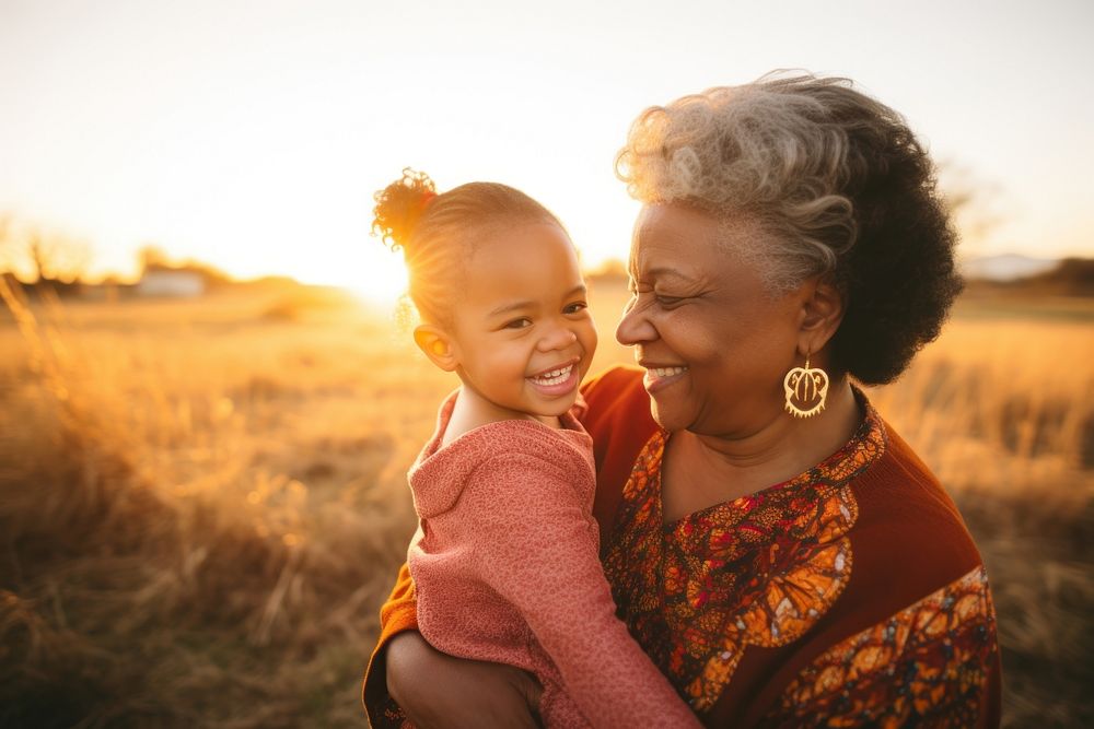 Grandmother grandchild portrait sunset. AI generated Image by rawpixel.
