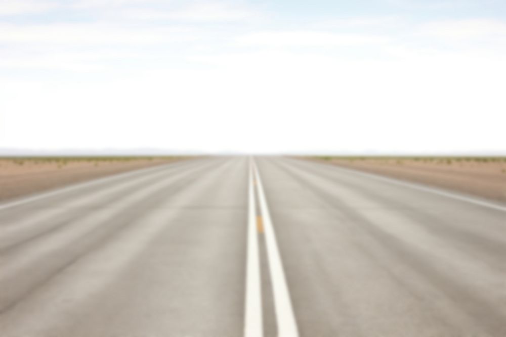 Blurred countryside road backdrop