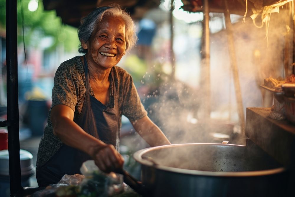 Senior smiling cooking street. 