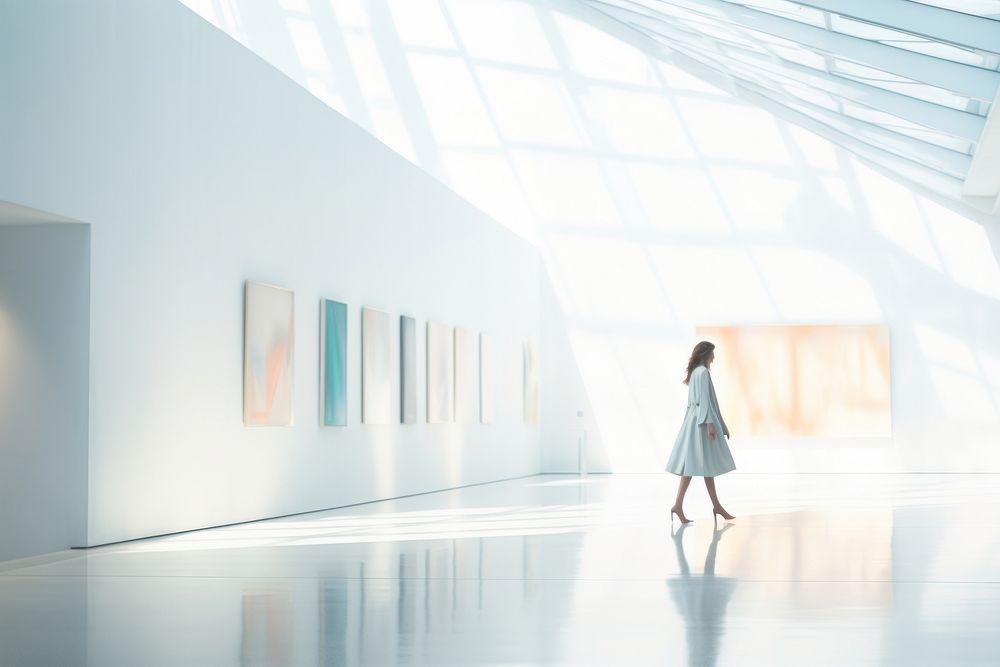 Defocused Woman Walking In large Exhibition Art Hall walking art architecture. AI generated Image by rawpixel.