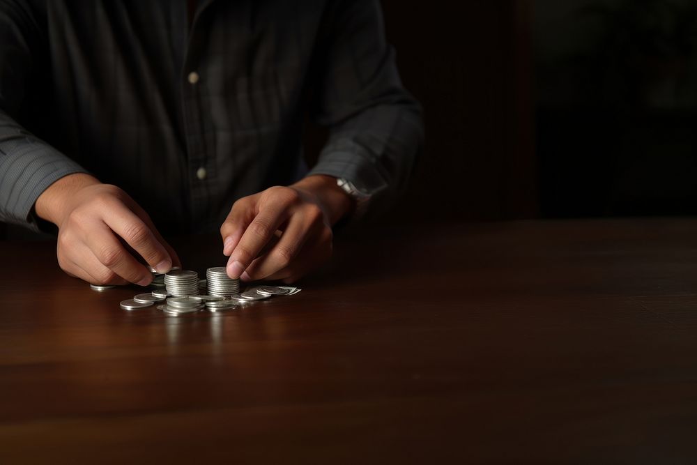 Counting money hand adult table. AI generated Image by rawpixel.