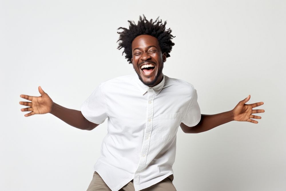 Happy relaxed black man dancing shouting laughing adult. AI generated Image by rawpixel.