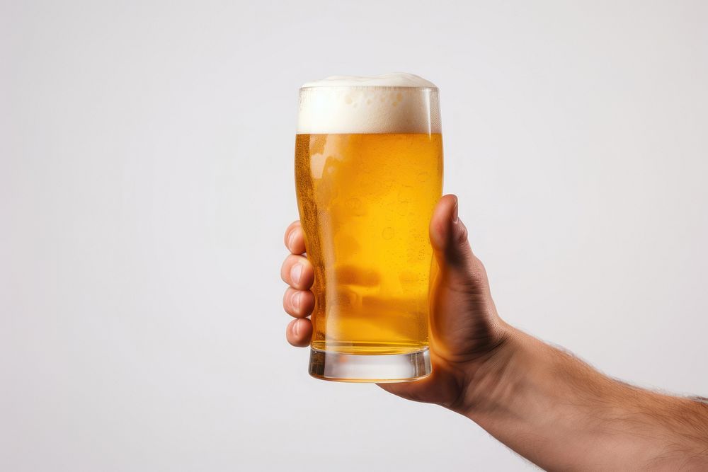 Beer holding drink lager. AI generated Image by rawpixel.
