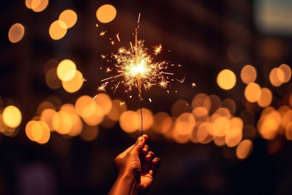 Burning sparkler fireworks outdoors holding. 