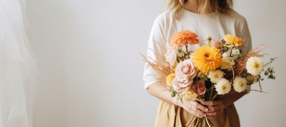 Florist holding beautiful bouquet wedding flower plant. 