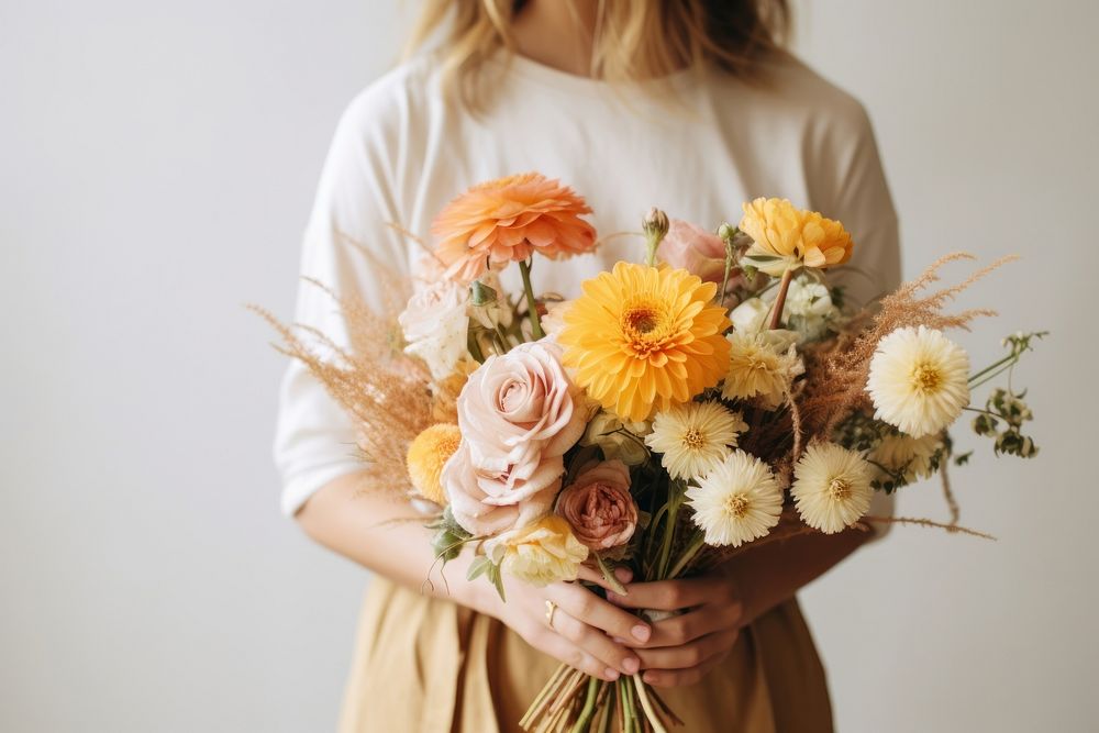 Florist holding beautiful bouquet flower plant adult. 