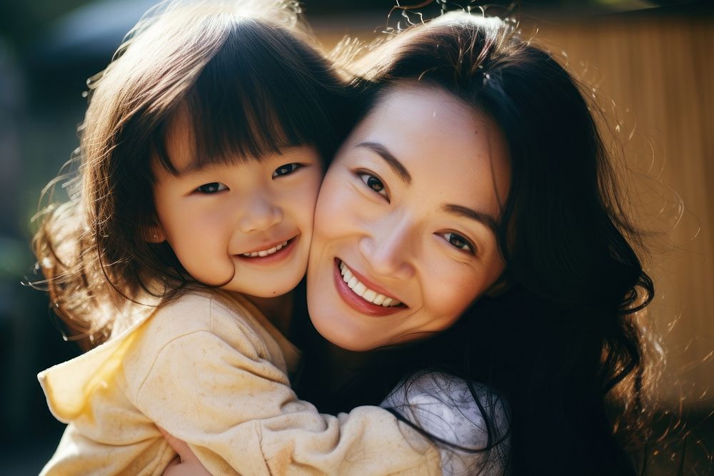 Asian daughter hugging mother adult smile happy. AI generated Image by rawpixel.