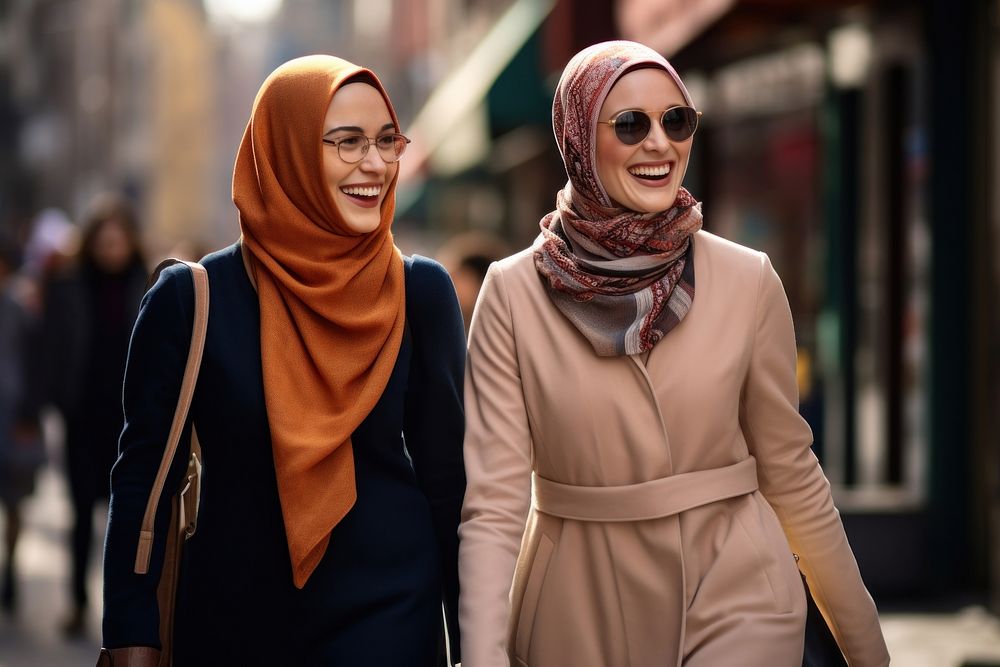 Muslim women laughing smiling smile. AI generated Image by rawpixel.