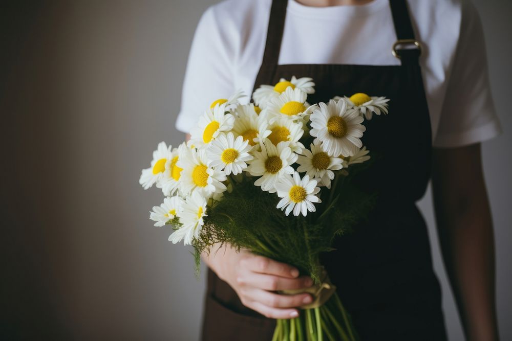 Florist daisy holding flower. AI generated Image by rawpixel.