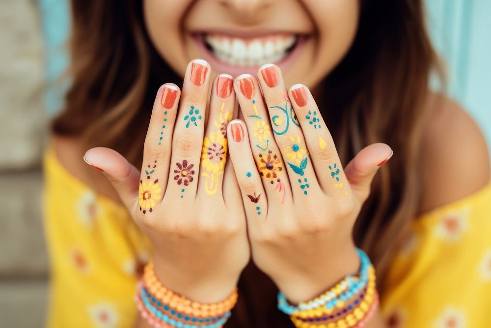 Nails painted hand finger smile. AI generated Image by rawpixel.