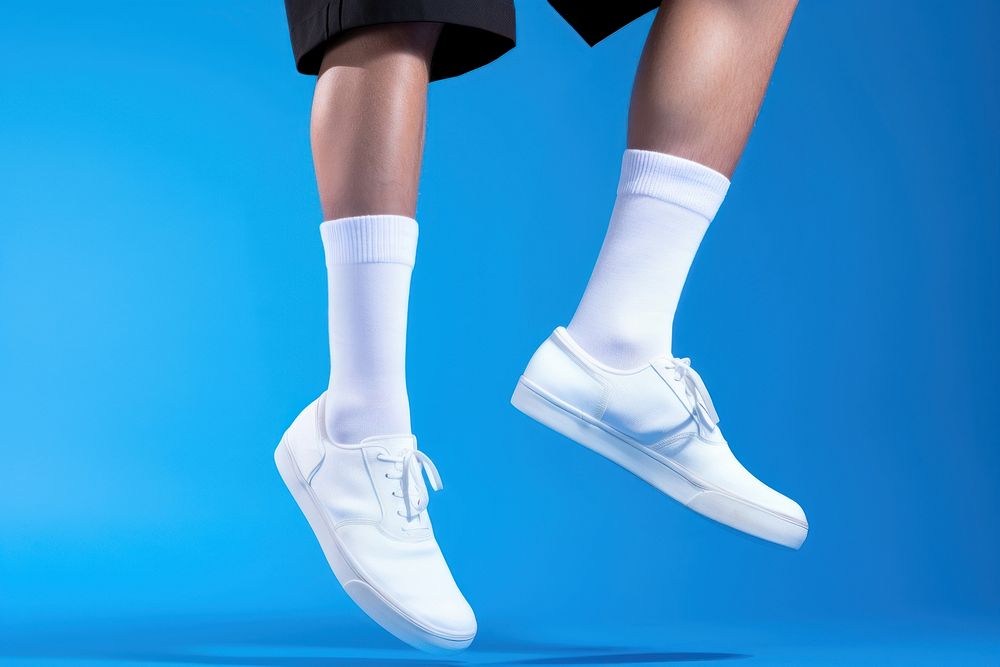 White socks footwear shoe blue. AI generated Image by rawpixel.