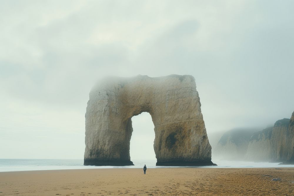 Landscape beach rock arch. AI generated Image by rawpixel.