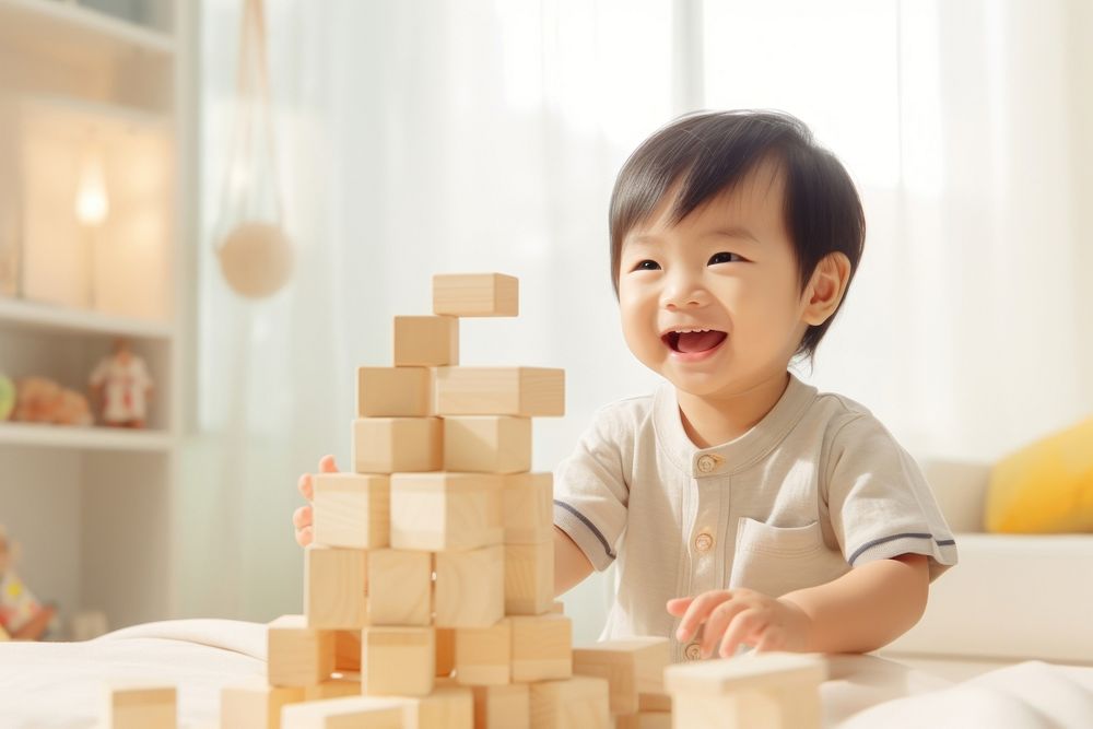 Asian Baby Playing baby construction relaxation. AI generated Image by rawpixel.