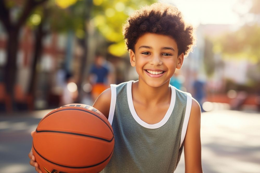 Boy basketball player cheerful sports smile. 