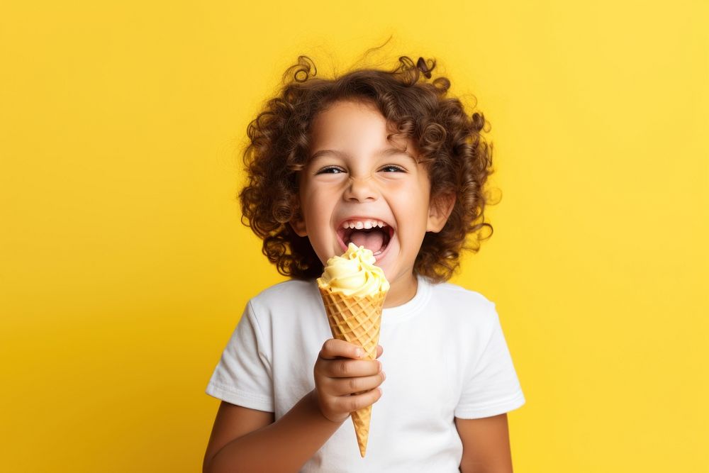 Kid eating ice cream cheerful dessert yellow. AI generated Image by rawpixel.